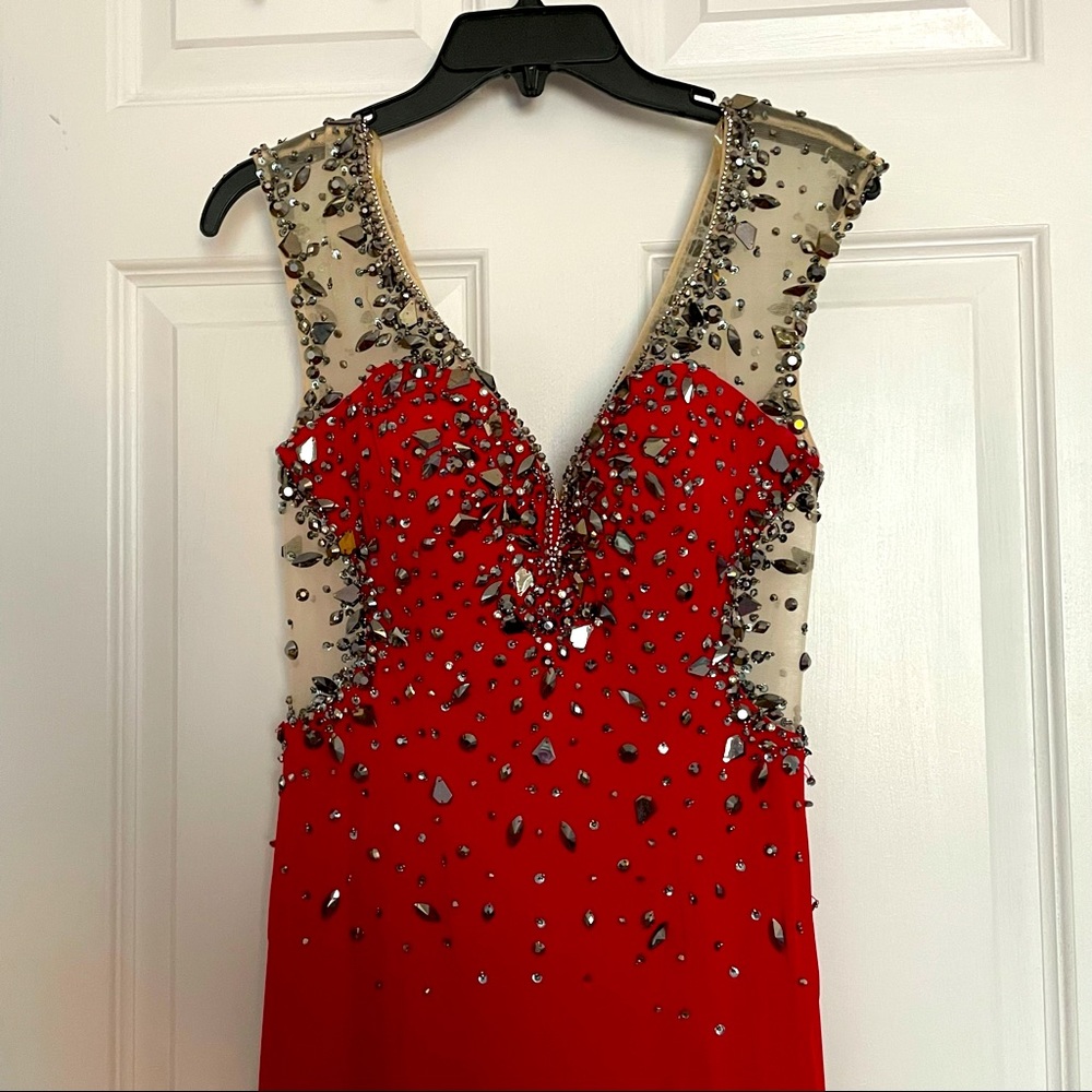Red prom dress with dark beading